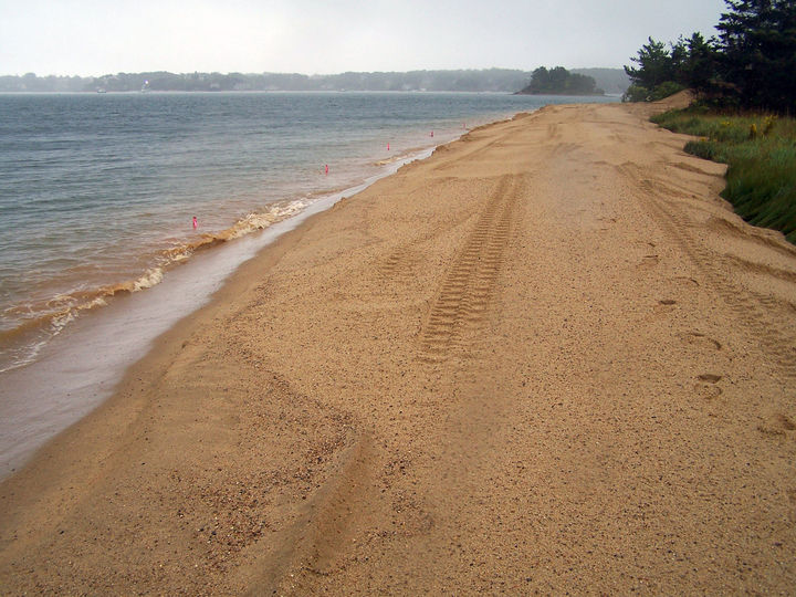 what is one of the dangers of replacing eroded beach sand with dredged sand from offshore
